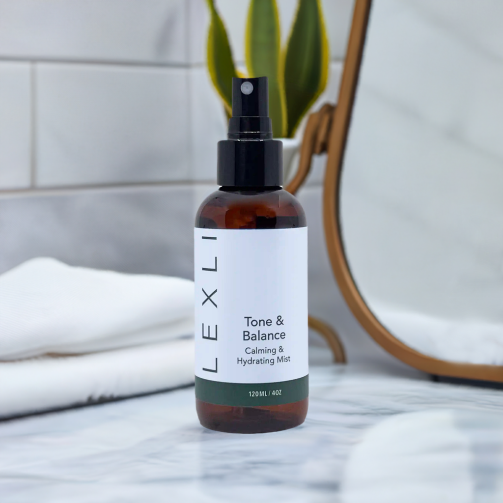 4 oz bottle of Tone & Balance on a bathroom vanity with mirror