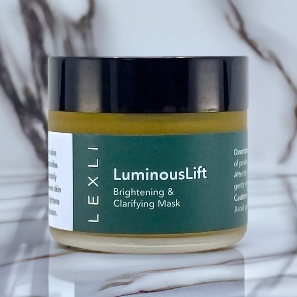 2 oz jar of LuminousLift on a marble countertop