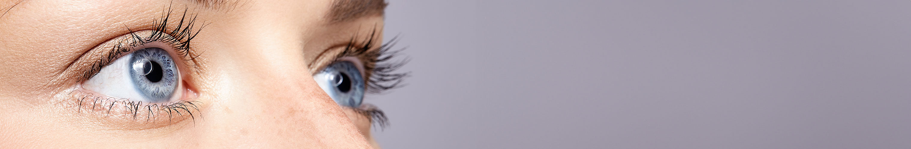 close-up of clear blue eyes looking up
