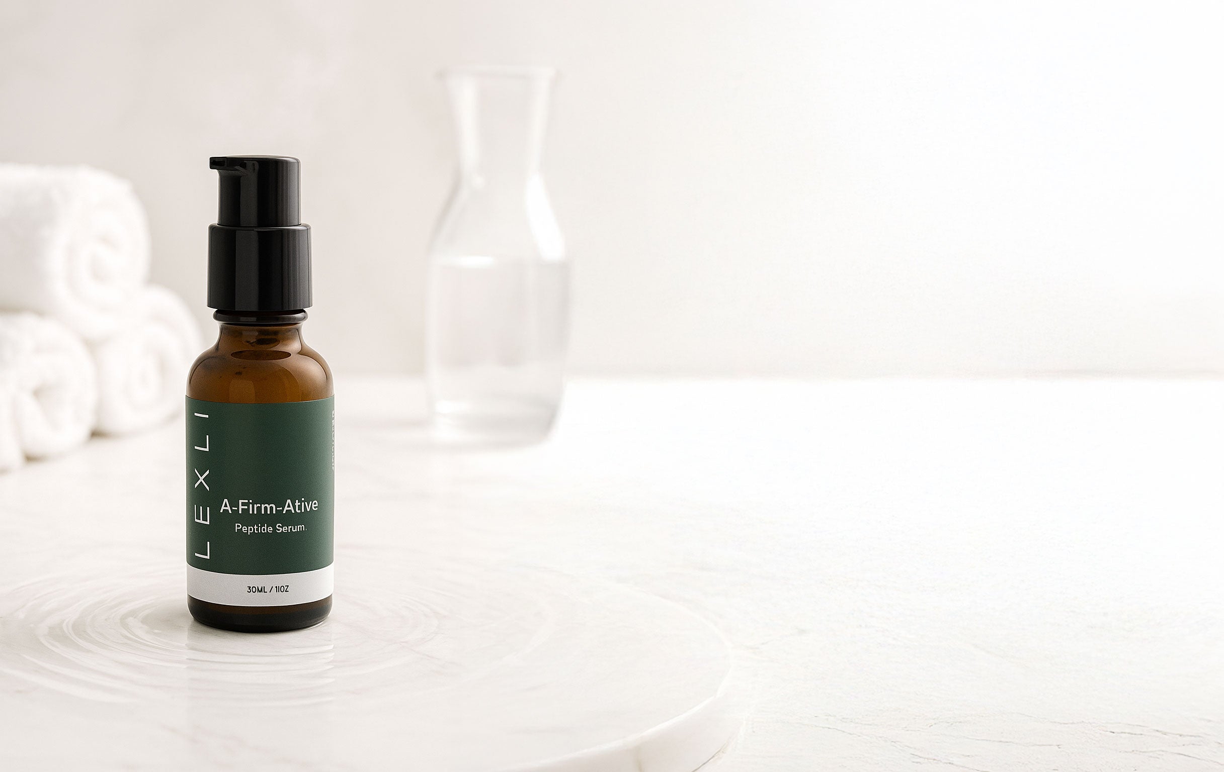 bottle of serum on a white counter
