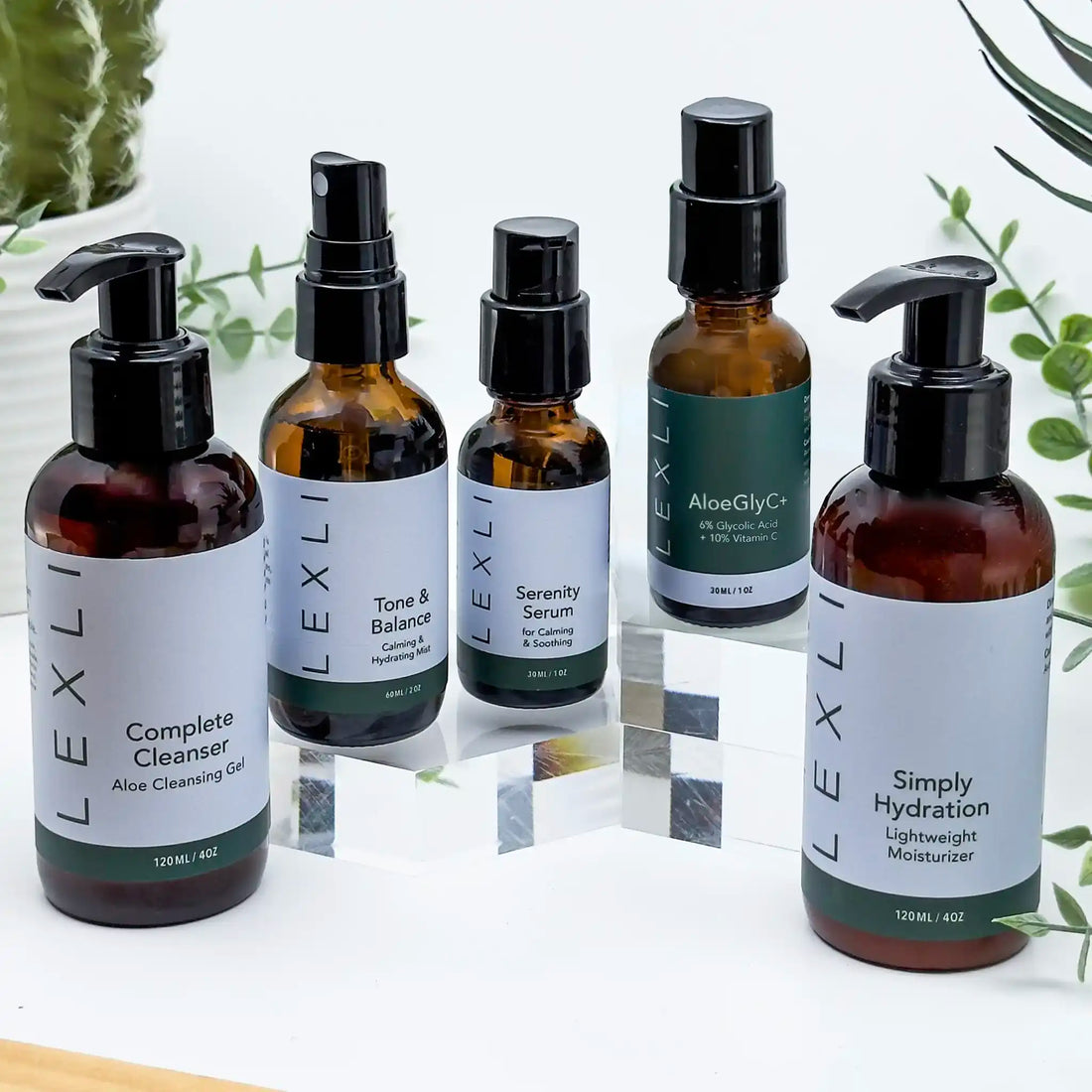 five bottles green and blue labels to make up the Skincare KIt for Combination Skin