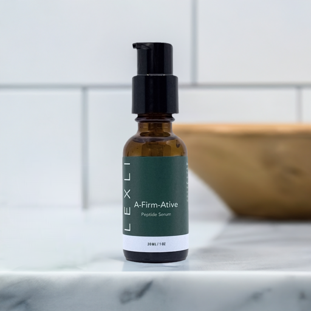 1 oz A-Firm-Ative bottle on a bathroom countertop