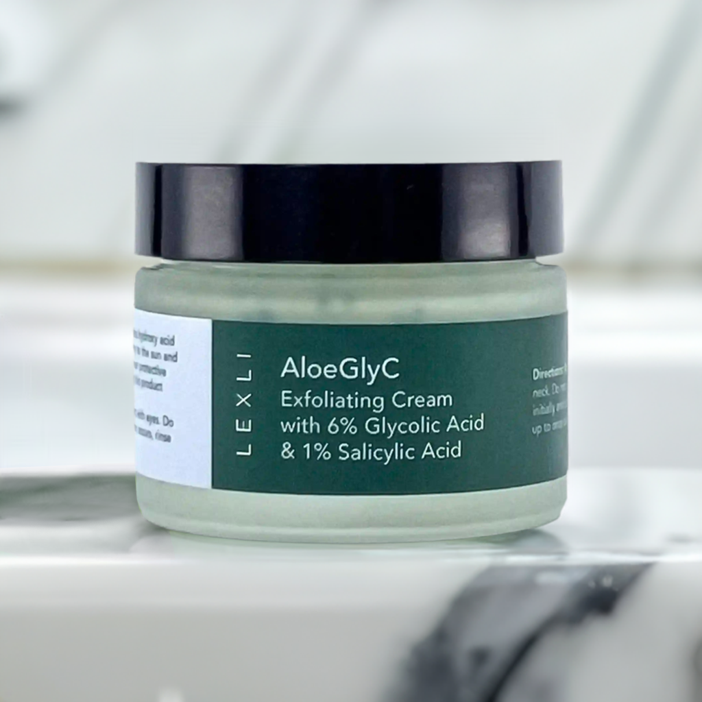 1 oz jar of AloeglyC on a marble countertop