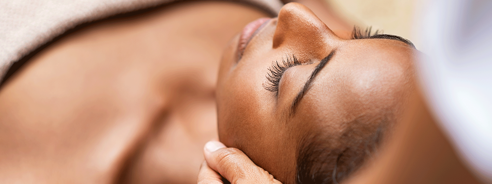 woman receiving professional skin care service