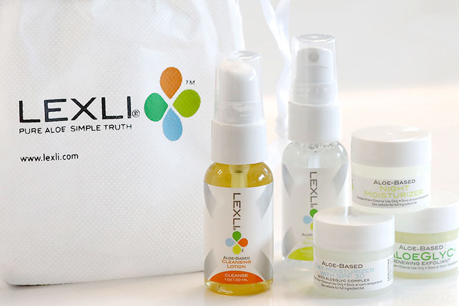 a Lexli trial skin care kit with bag on a bathroom sink
